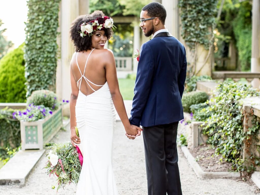 newlyweds holding hands