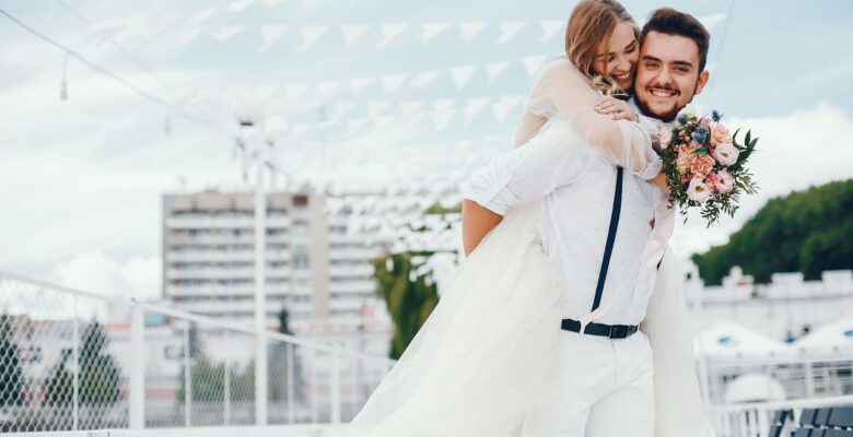 Brise hug groom on their wedding