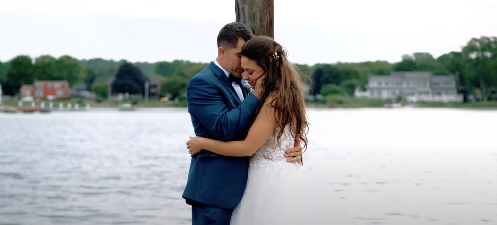 Bride and groom near the river