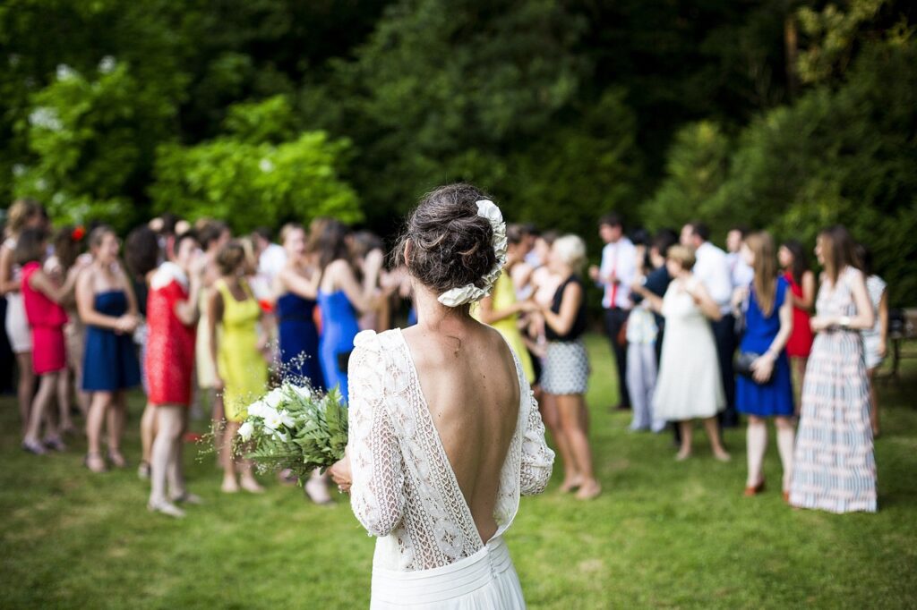 he bride is preparing to throw a bouquet