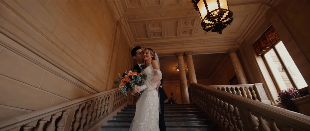 Bride and groom on the steps