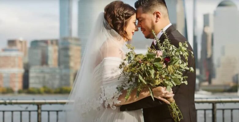 Bride and groom against the backdrop of the city