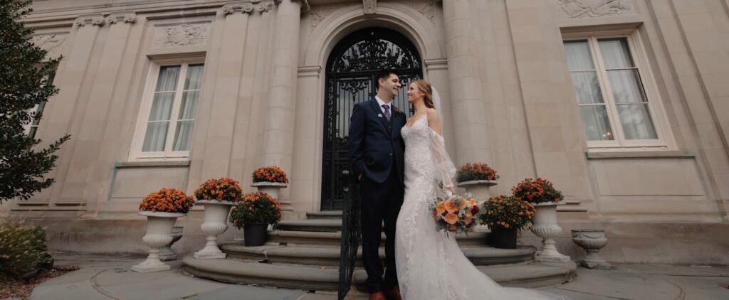 Bride and groom near the mansion