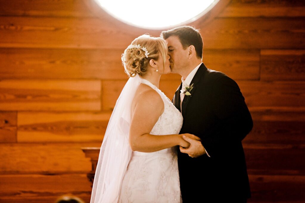 Bride and groom kissing
